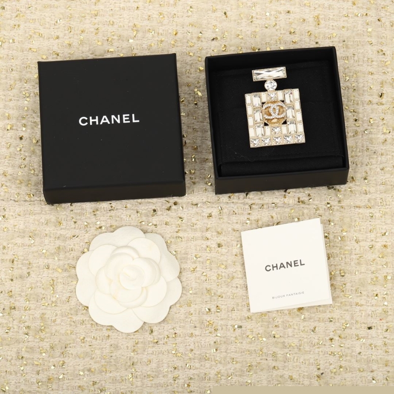 Ch*el brooches